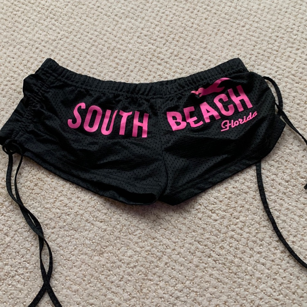 Cute — sexy low-cut South Beach short shorts.